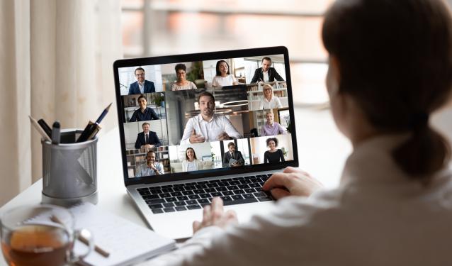 Woman facing computer on Zoom